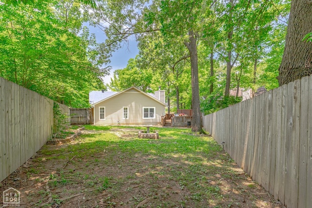 1207 Hunters Run Cv, Jonesboro, AR 72401 - fenced backyard with a wooden deck