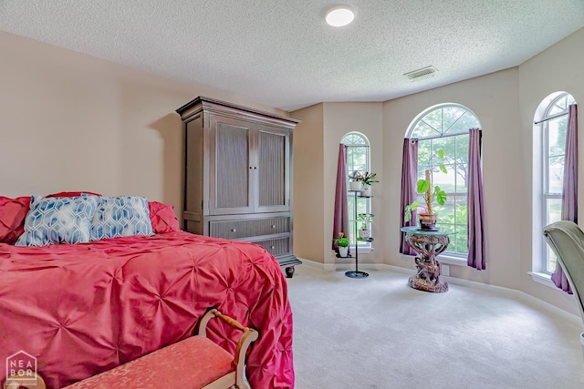 1207 Hunters Run Cv, Jonesboro, AR 72401 - carpeted bedroom featuring a textured ceiling
