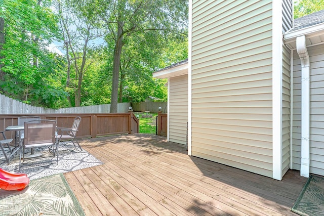 1207 Hunters Run Cv, Jonesboro, AR 72401 - wooden terrace featuring a fenced backyard and outdoor dining space