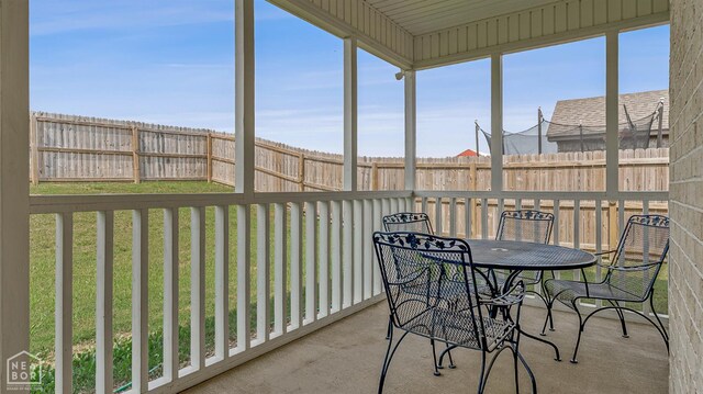 107 Hidden Creek St, Brookland, AR 72417 - sunroom with outdoor dining space