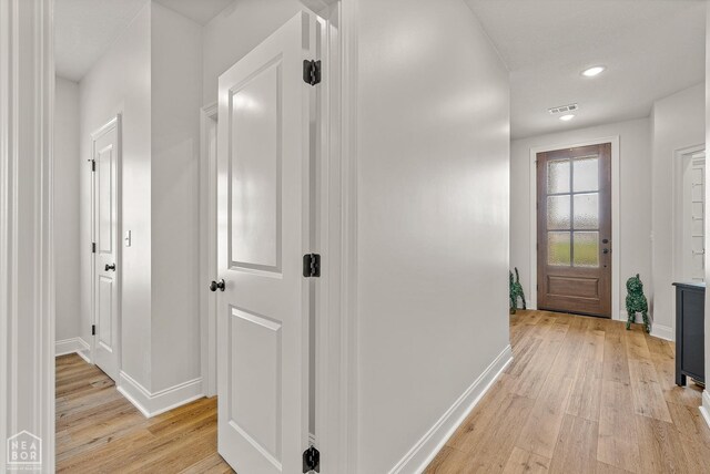 107 Hidden Creek St, Brookland, AR 72417 - hall featuring light wood-style floors, baseboards, and recessed lighting