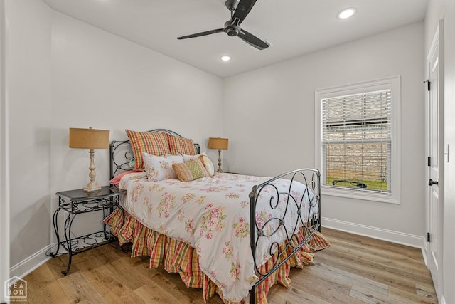 107 Hidden Creek St, Brookland, AR 72417 - bedroom featuring baseboards, wood finished floors, recessed lighting, and a ceiling fan