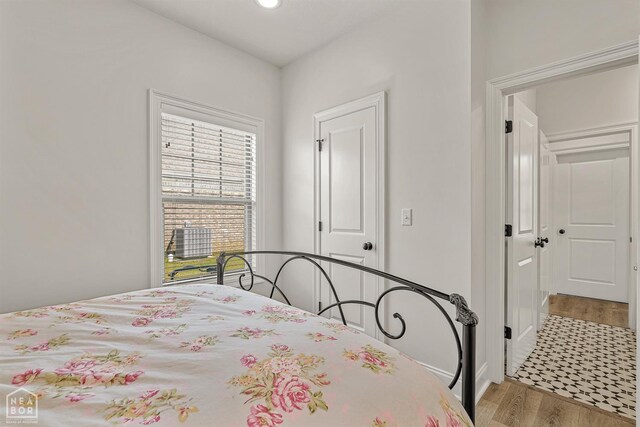 107 Hidden Creek St, Brookland, AR 72417 - bedroom featuring wood finished floors and recessed lighting