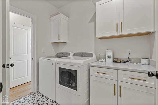 107 Hidden Creek St, Brookland, AR 72417 - laundry area with cabinet space and washer and dryer