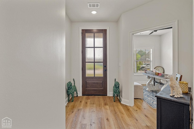 107 Hidden Creek St, Brookland, AR 72417 - entryway featuring baseboards, light wood-style floors, healthy amount of natural light, and recessed lighting