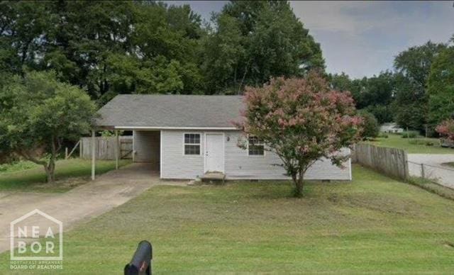 1500 W Nettleton Ave, Jonesboro, AR 72401 - view of front of property with driveway and an attached carport