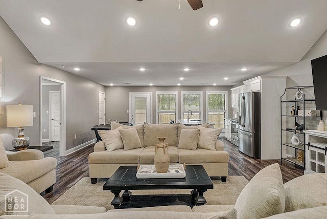 2100 N 29th St, Paragould, AR 72450 - living area with baseboards, recessed lighting, and wood finished floors