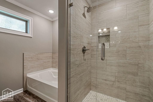 2100 N 29th St, Paragould, AR 72450 - bathroom featuring a garden tub, ornamental molding, and a shower stall