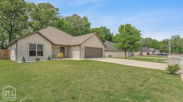 2100 N 29th St, Paragould, AR 72450 - ranch-style house with an attached garage, driveway, a front lawn, and brick siding