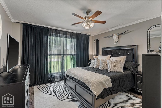 2100 N 29th St, Paragould, AR 72450 - bedroom featuring ornamental molding and a textured ceiling