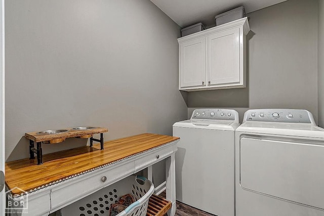 2100 N 29th St, Paragould, AR 72450 - laundry area with washer and clothes dryer, cabinet space, and wood finished floors