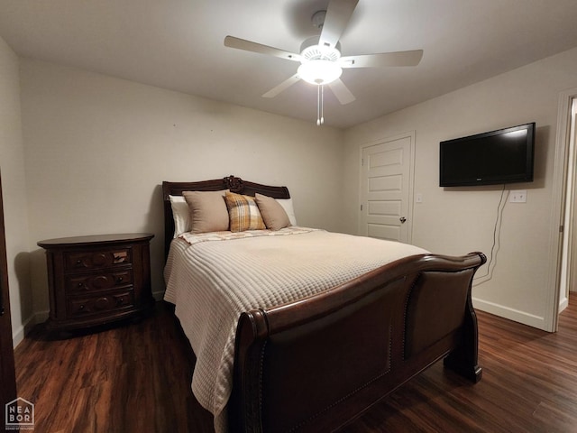 bedroom with dark wood-style flooring, baseboards, and a ceiling fan