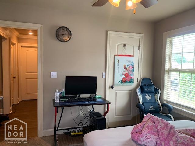 4709 Summit Ridge Dr, Jonesboro, AR 72404 - bedroom with multiple windows, baseboards, a ceiling fan, and wood finished floors