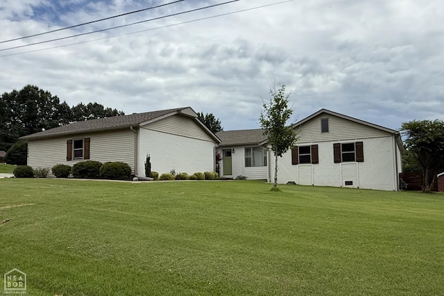 1354 Wiley Dr, Piggott, AR 72454 - ranch-style house with a front lawn and brick siding