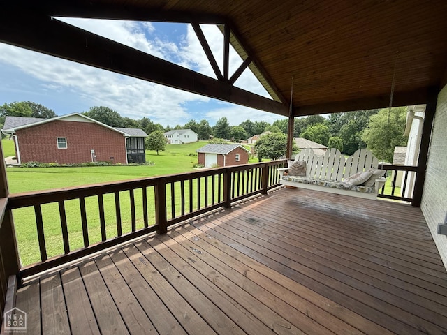 1354 Wiley Dr, Piggott, AR 72454 - wooden terrace with a yard, an outbuilding, and a residential view