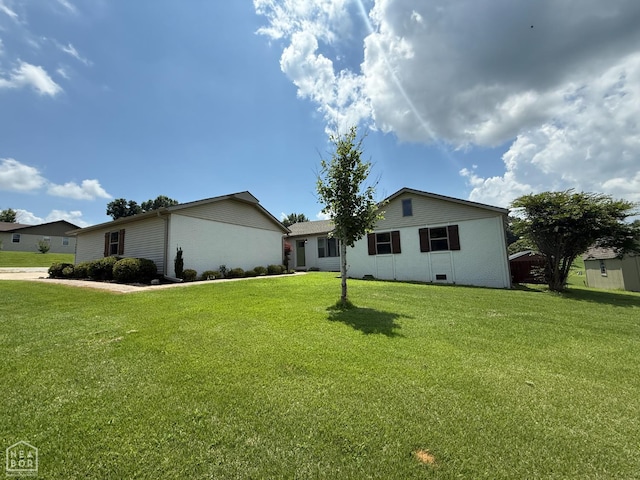 1354 Wiley Dr, Piggott, AR 72454 - view of front of home with a front lawn