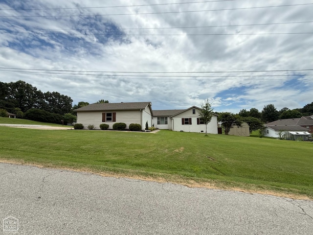 1354 Wiley Dr, Piggott, AR 72454 - ranch-style home featuring a front lawn