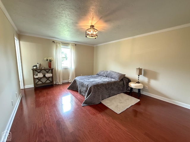 1354 Wiley Dr, Piggott, AR 72454 - bedroom featuring dark wood-style floors and ornamental molding