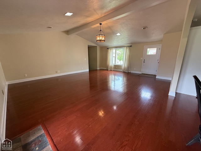 1354 Wiley Dr, Piggott, AR 72454 - unfurnished living room featuring a chandelier and wood finished floors