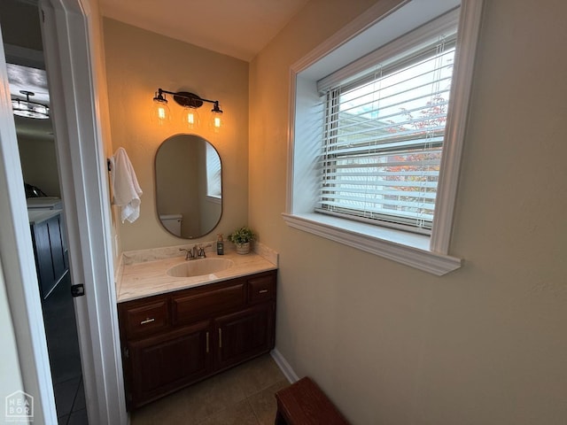1354 Wiley Dr, Piggott, AR 72454 - bathroom featuring tile patterned floors and vanity