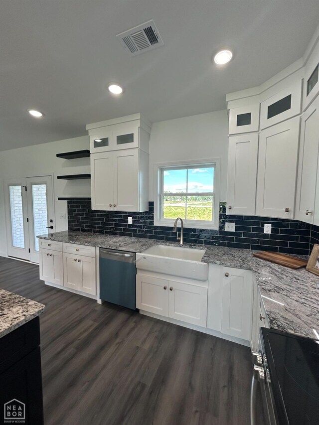 812 Pecan Grv, Trumann, AR 72472 - kitchen featuring dishwashing machine, a sink, open shelves, electric stove, and white cabinets