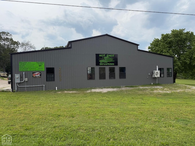 2052 Central Blvd, Bull Shoals, AR 72619 - view of home's exterior featuring a lawn