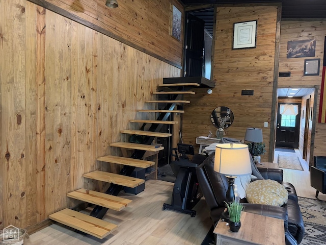 2052 Central Blvd, Bull Shoals, AR 72619 - staircase featuring wood walls and wood finished floors