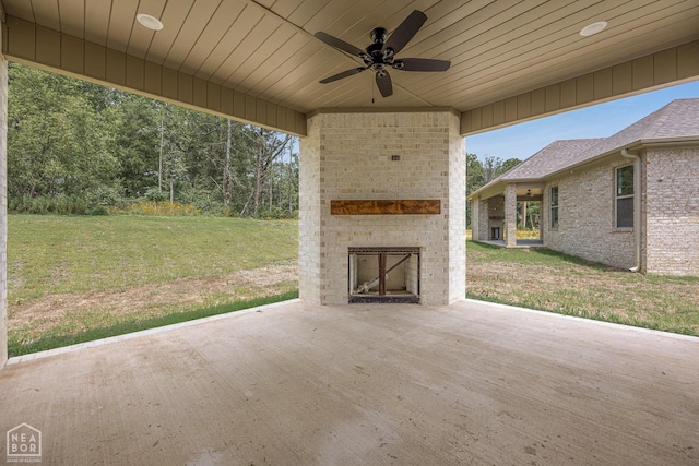 3428 Hudson Dr, Jonesboro, AR 72405 - view of patio featuring ceiling fan and an outdoor brick fireplace