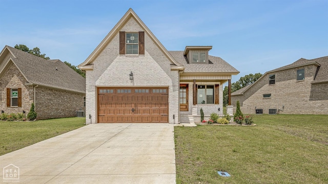 3428 Hudson Dr, Jonesboro, AR 72405 - view of front of property with an attached garage, concrete driveway, central air condition unit, a front lawn, and roof with shingles