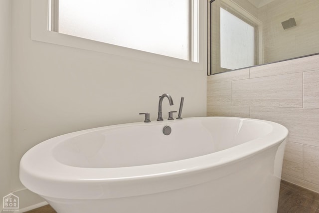 3428 Hudson Dr, Jonesboro, AR 72405 - full bath featuring tile walls and a freestanding bath