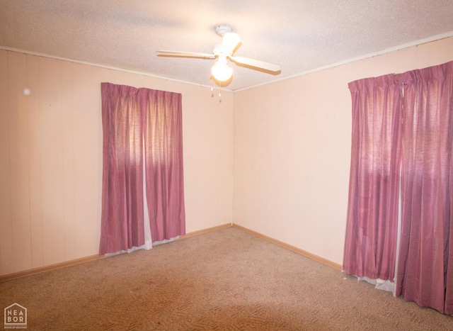 805 James Ln, Trumann, AR 72472 - unfurnished room with carpet flooring, a textured ceiling, a ceiling fan, and ornamental molding