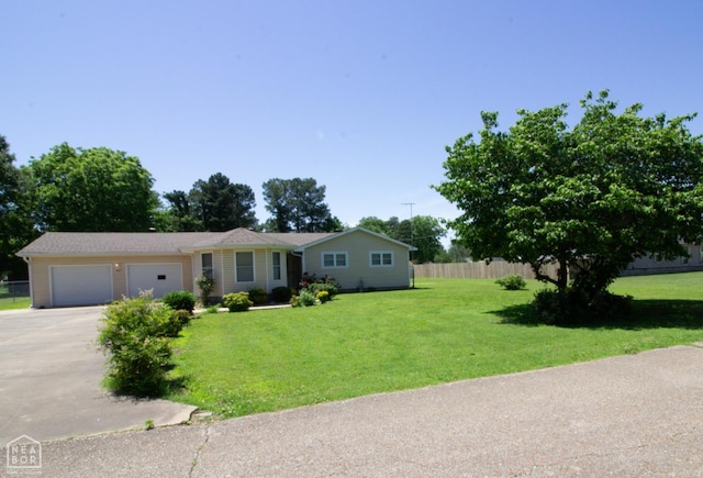 805 James Ln, Trumann, AR 72472 - ranch-style home with concrete driveway and an attached garage