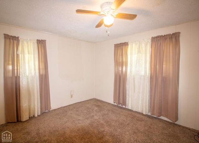 805 James Ln, Trumann, AR 72472 - carpeted spare room with ceiling fan and a textured ceiling