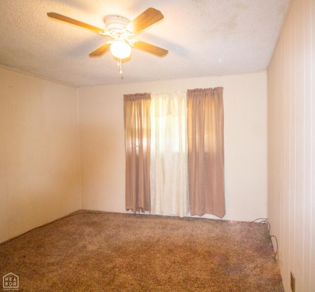 805 James Ln, Trumann, AR 72472 - carpeted empty room featuring a ceiling fan and a textured ceiling