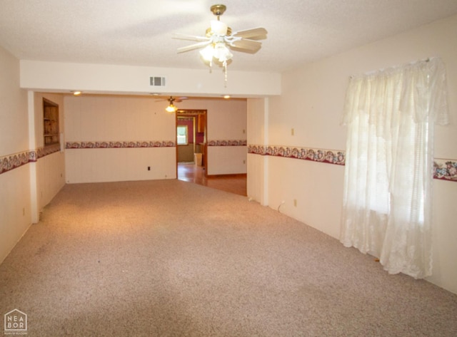 805 James Ln, Trumann, AR 72472 - unfurnished room featuring ceiling fan and light colored carpet