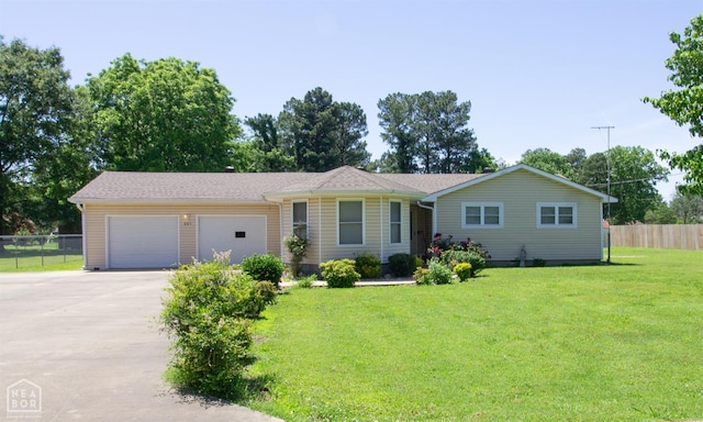 805 James Ln, Trumann, AR 72472 - ranch-style home with driveway and an attached garage