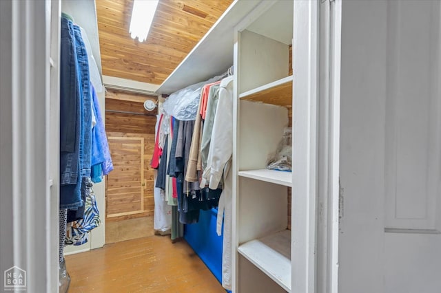 spacious closet with wood finished floors