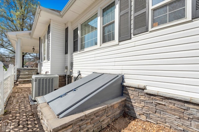 details featuring central AC unit, a skylight, and a bulkhead entry