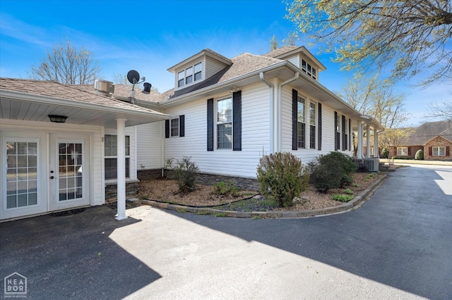 view of home's exterior with french doors