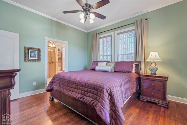 bedroom featuring baseboards, a ceiling fan, crown molding, ensuite bath, and wood finished floors