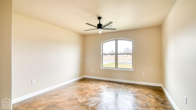 165 Nelson Cir, Trumann, AR 72472 - unfurnished room with concrete floors, baseboards, and a ceiling fan