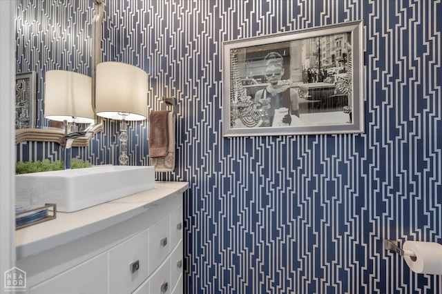 4260 Weldon Cv, Jonesboro, AR 72404 - bathroom featuring wallpapered walls and vanity