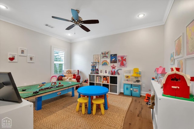 4260 Weldon Cv, Jonesboro, AR 72404 - rec room with recessed lighting, light wood-style floors, a ceiling fan, and crown molding