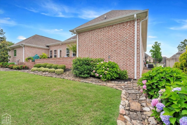 4260 Weldon Cv, Jonesboro, AR 72404 - view of side of home with brick siding and a shingled roof