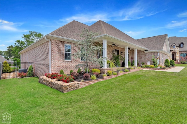 4260 Weldon Cv, Jonesboro, AR 72404 - view of front of house with brick siding, a ceiling fan, and roof with shingles