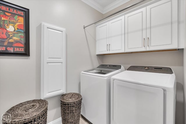 4260 Weldon Cv, Jonesboro, AR 72404 - washroom featuring washing machine and dryer, cabinet space, crown molding, and baseboards