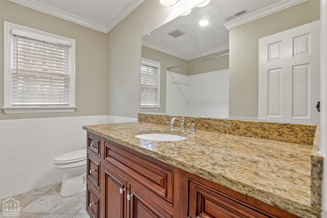 full bath featuring visible vents, tile walls, crown molding, and toilet