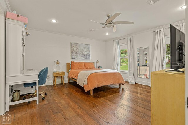 803 Fairway Dr, Jonesboro, AR 72401 - bedroom with crown molding, ceiling fan, recessed lighting, wood-type flooring, and baseboards