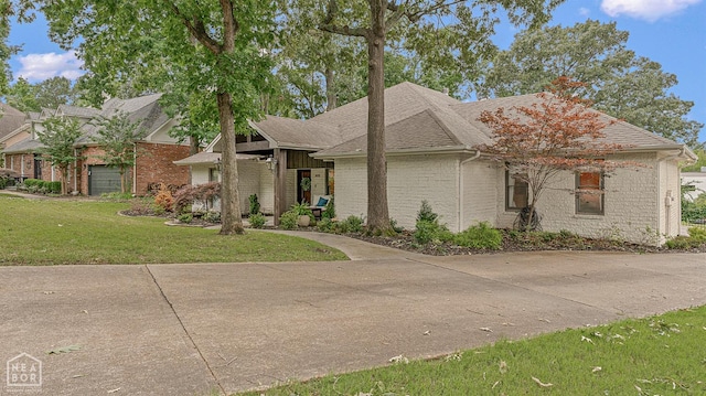 803 Fairway Dr, Jonesboro, AR 72401 - view of front of house featuring a front yard and brick siding