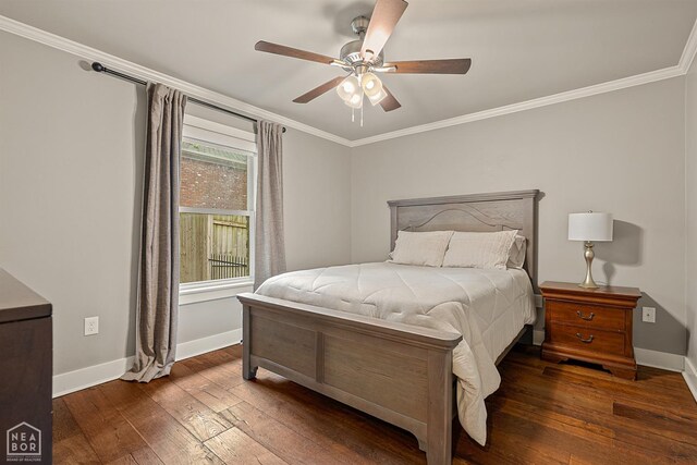 803 Fairway Dr, Jonesboro, AR 72401 - bedroom with crown molding, baseboards, and hardwood / wood-style flooring